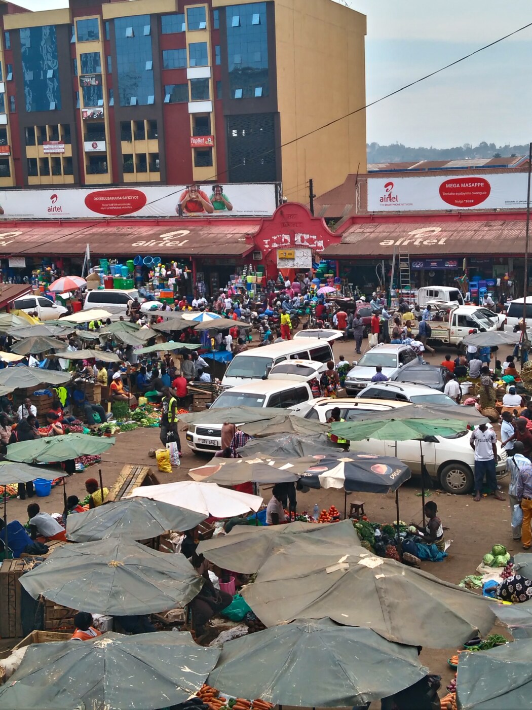 Traders and shoppers at Nakasero Market, Kampala